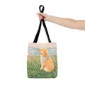 Tote bag printed with a Golden Retriever puppy in a wildflower meadow wearing a pastel bandana