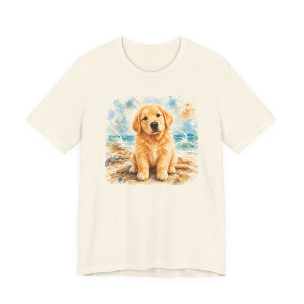 Natural t-shirt printed with a Golden Retriever puppy sitting on the shore among soft watercolor waves